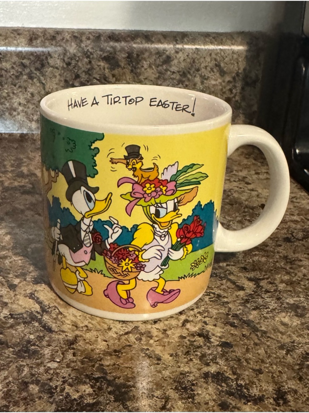 Disney Yellow Daisy Duck Donald Duck Easter Ceramic Mug with Colorful Print